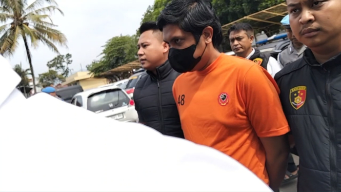 Tersangka MSR saat digiring petugas 