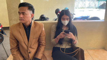 Korban Wina saat mendatangi Polda Sumatera Selatan.