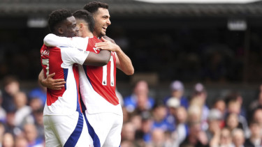 Pemain Arsenal rayakan gol
