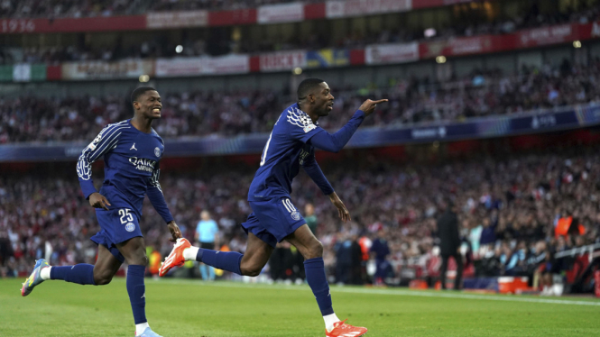 Pemain PSG, Ousmane Dembele rayakan gol ke gawang Arsenal
