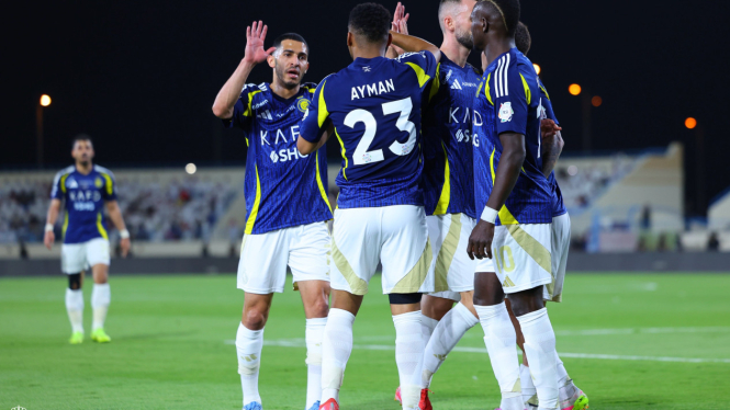 pemain Al Nassr merayakan gol