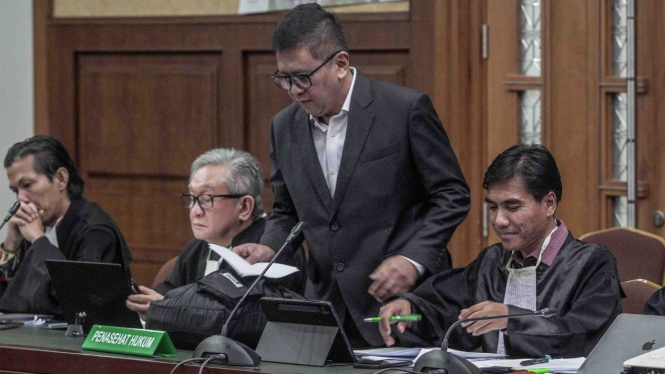 Hasto Kristiyanto saat di sidang kasus suap PAW DPR.