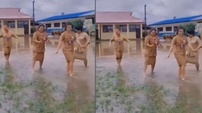 Aksi kepala sekolah pamer sekolah kebanjiran.
