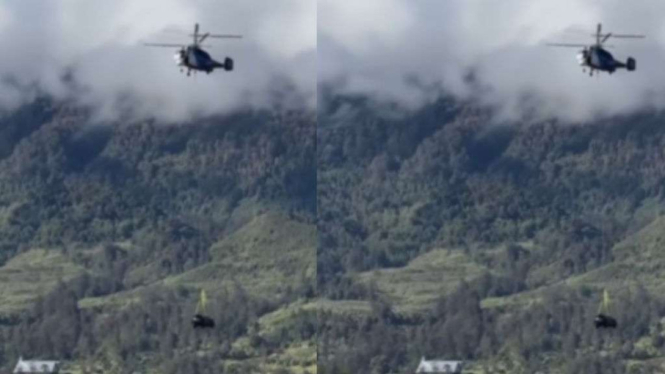 Helikopter antar mobil.
