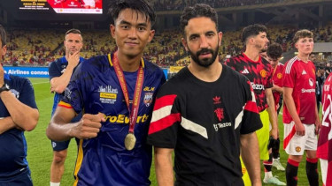 Kakang Rudianto dan manajer MU Ruben Amorim