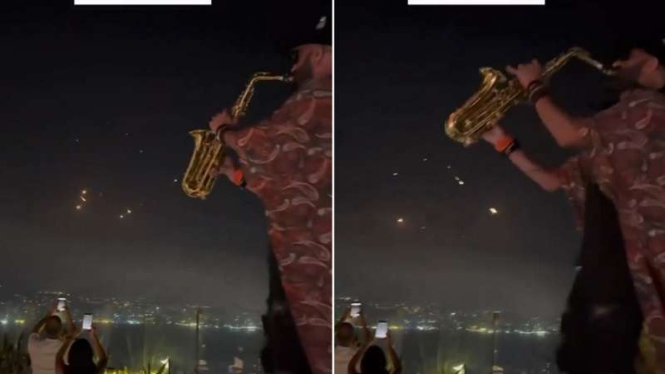 Warga Lebanon bermain saxophone saat Iran serang Israel