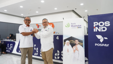 Kolaborasi Pos IND dan Bank Muamalat.