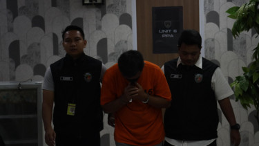 IM (tengah) pelaku pelecehan penumpang Citilink