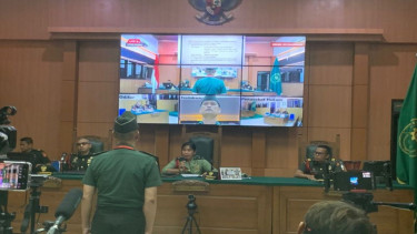 Terdakwa Peltu Yun Heri Lubis pada sidang pembacaan vonis