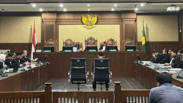 Sidang pembacaan surat dakwaan kasus dugaan suap terhadap putusan lepas