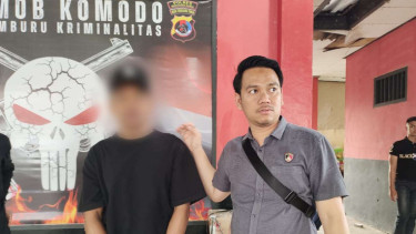Eras, salah satu pelaku penculikan Kacab BRI Cempaka Putih (kiri)